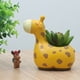 thumbnail image 4 of Maceta de resina con forma de jirafa, decoración con agujeros, maceta elegante para plantas y flores, 2 uds., 4 of 4