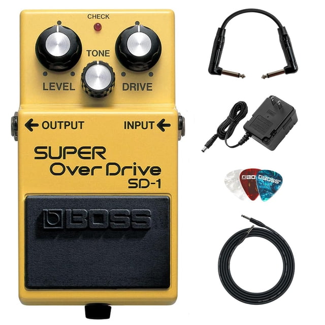 pedal de efecto boss sd-1 super overdrive con adaptador y accesorios Pedal BOSS SD-1 color negro, vista frontal centrada con perillas Level, Tone y Drive y etiquetas INPUT/OUTPUT y logo BOSS; junto a adaptador de corriente, cable de instrumento premium, cable patch en ángulo y tres púas multicolor; ideal para pedales para guitarra y realzar rango medio con overdrive suave.