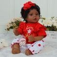 thumbnail image 4 of Muñeca Reborn Baby Doll SCOM, negra, 50 cm, afroamericana, con atuendo rojo, 4 of 7