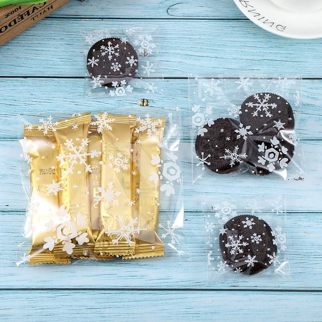 Bolsa de embalaje de regalo de Navidad, bolsa de plástico con estampado de copos de nieve, paquete de dulces, 100 Uds.