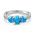 thumbnail image 2 of Gem Stone King 10K White Gold Blue Opal and White Lab Grown Diamond 3 Stone Engagement Ring for Women (1.67 Cttw, Oval Cabochon Gemstone October Birthstone, Available in Size 5, 6, 7, 8, 9), 2 of 5