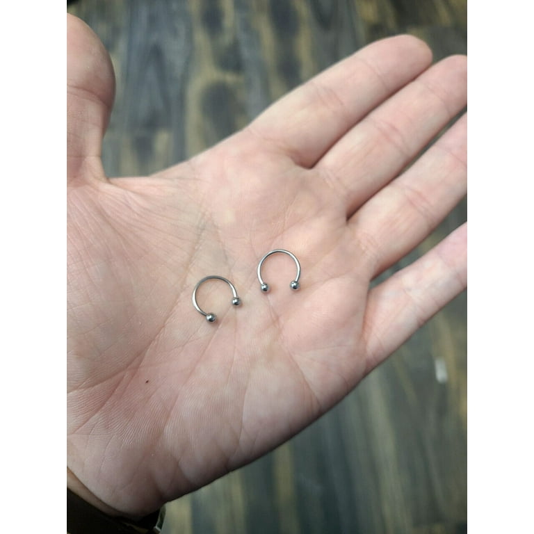 Steel piercing for ear of eyebrow, skeleton hand, various colours