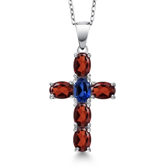 Gem Stone King 925 Sterling Silver Red Garnet and Blue Created Sapphire Cross Pendant Necklace for Women | 3.45 Cttw | Gemstone January Birthstone | Oval 6X4MM | With 18 inch Chain