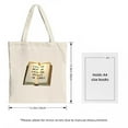thumbnail image 3 of Light - colored canvas tote bag featuring a printed open book with a golden border and the text " IT WAS THE BEST OF TIMES ", 3 of 4