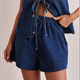 thumbnail image 4 of Conjunto de Dos Piezas de Mezclilla con Top con Lazo para Mujer, Sin Mangas, Escote en V Profundo, Chaleco, Pantalones Cortos con Cintura Elástica Azul Oscuro M, 4 of 10