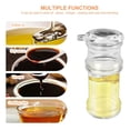 thumbnail image 4 of Una botella de cristal acrílico al azar que contiene aceite de oliva y vinagre de soja., 4 of 7