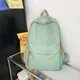 thumbnail image 4 of Mochila de nailon ligera y moderna de color sólido versátil de gran venta 2024, nueva mochila escolar informal de alta capacidad, 4 of 5