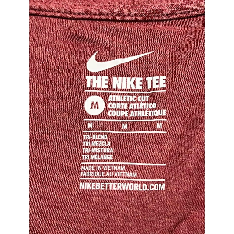 gold and red nike shirt