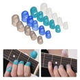 thumbnail image 2 of Guitar Accessories Kit Includes 20pcs Silicone Guitar Finger Protectors + 10pcs Guitar Picks + 4pcs Thumb & Finger Picks + Pick Holder + 2pcs Music Page Clips with Storage Box for Acoustic Guitar Beg, 2 of 6