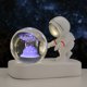 thumbnail image 1 of Bola de cristal tallada con luz de noche con forma de astronauta y base luminosa para estudiantes y amigos, 1 of 6