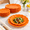 Orange, variant on White 60-Piece Scalloped Heavy Duty Disposable Plastic Plate Set