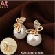 thumbnail image 1 of Pendientes de perlas redondas de moda coreana de lujo para mujer Tan Jianjun unisex, 1 of 2