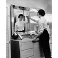 thumbnail image 2 of Side profile of a young woman cleaning the mirror of a dressing table Poster Print (18 x 24), 2 of 4