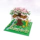 thumbnail image 3 of Casa del árbol con flores rosas y cerezos en invierno para niña, bloques de construcción de partículas, juguete para adultos, accesorios de montaje, 3 of 3