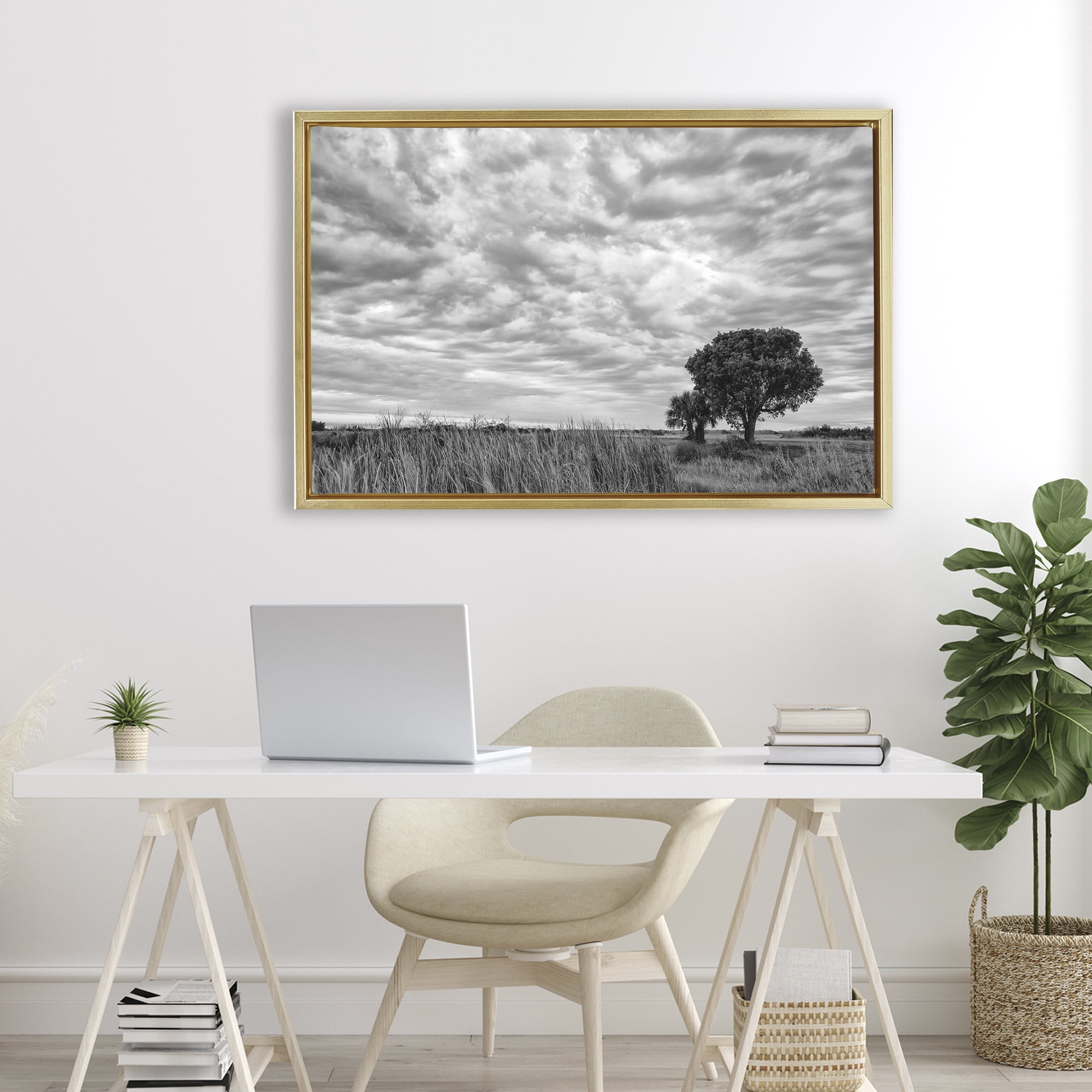 Stupell Industries Solitary Tree Beneath Clouds Gold Framed Floater Canvas Wall Art, design by Jon Evan