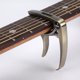 thumbnail image 1 of Guitarra folk de tono variable, guitarra eléctrica de metal, clip de tono variable, accesorios para ukelele, clip de afinador unisex, 1 of 2