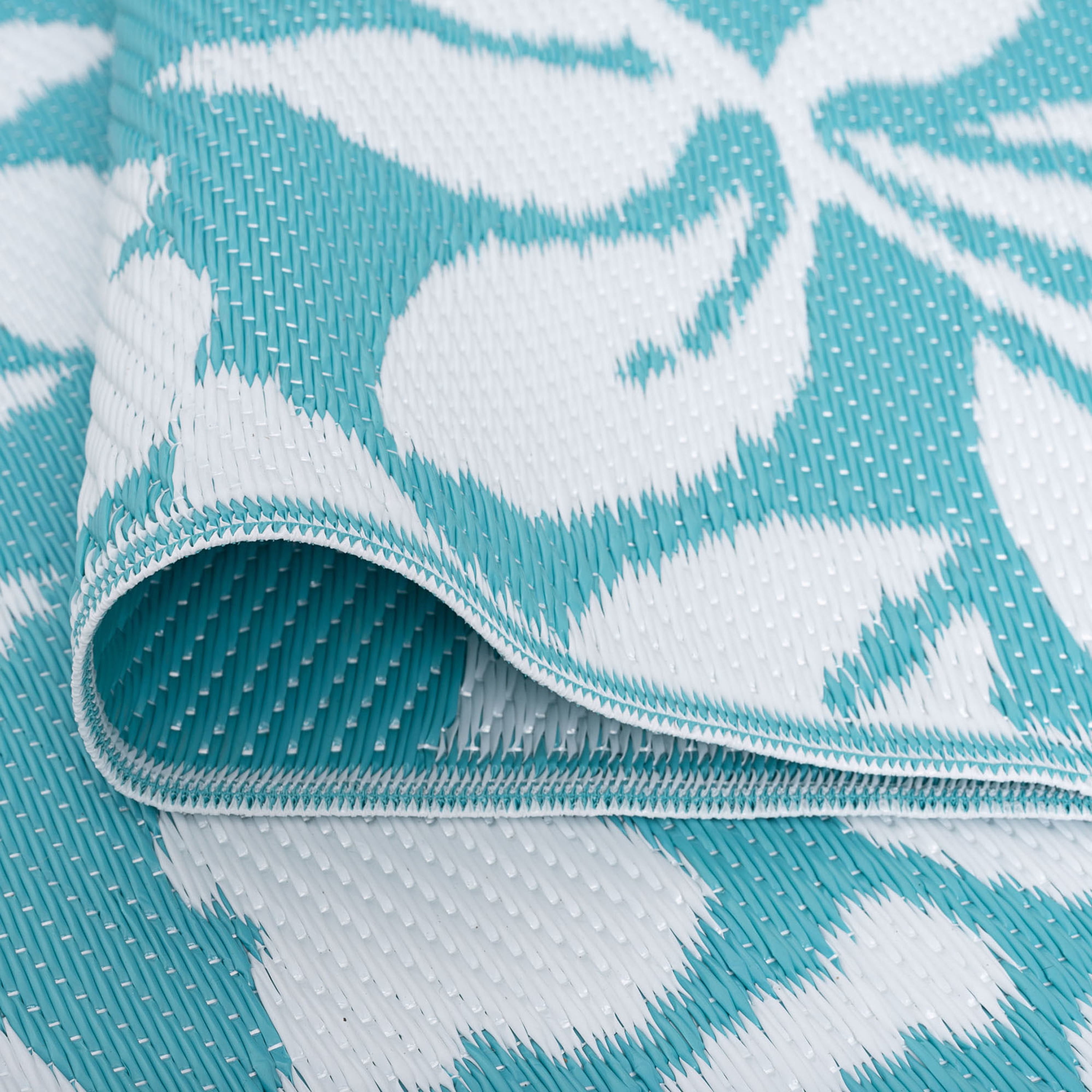 6x9 Reversible Aqua and White Polypropylene Outdoor Floral Area Rug