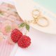 thumbnail image 3 of Llavero de aleación 3D con cristal de cerezo y frutas con acabado rojo, 3 of 3