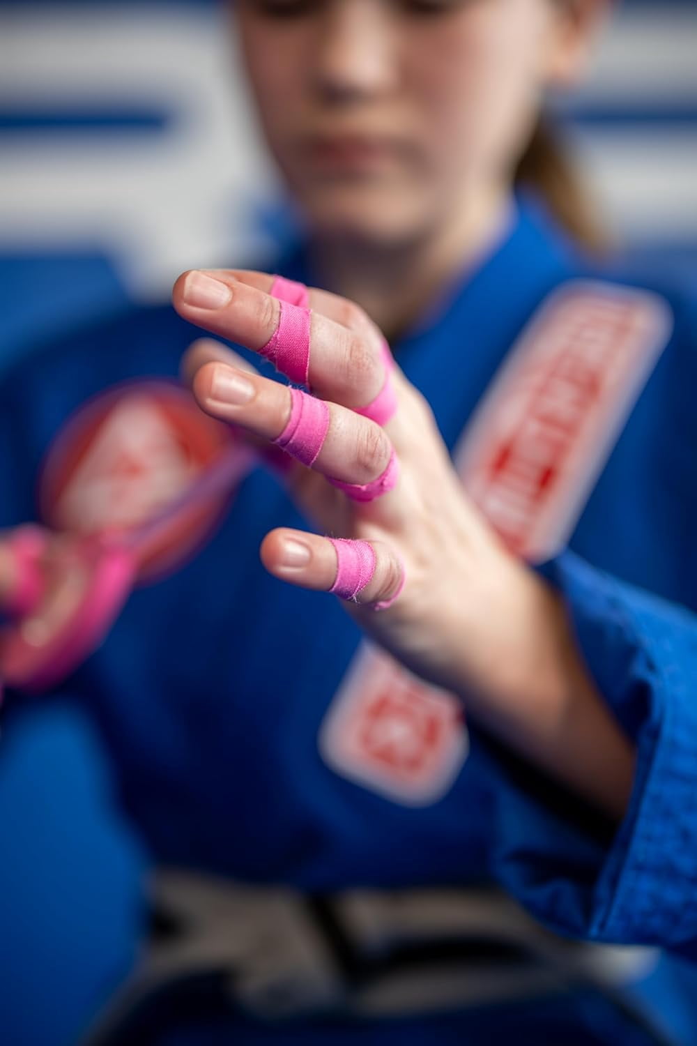 Bighorn Athletics Pro Series Jiu-Jitsu Finger Tape, 8-Rolls with Tin Holder, Enhanced Extra Strength, Residue-Free (0.3-Inch, Pink)