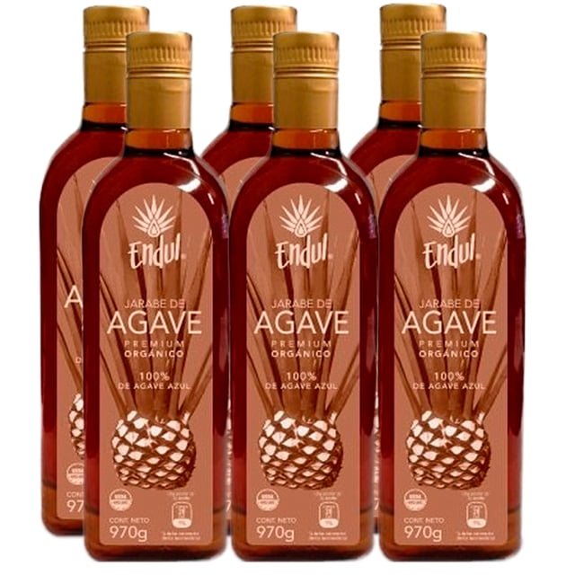 3 botellas miel de agave endul premium obscura 970 gr pack de tres con vista frontal, botellas ámbar con etiqueta marrón y logo Endul, texto "Jarabe de Agave" y dibujo de piña de agave; tapas doradas. Jarabe de agave apto para usar como sustituto del azúcar en bebidas y recetas.