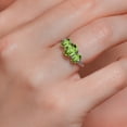 thumbnail image 5 of Gem Stone King 10K White Gold Green Peridot and White Lab Grown Diamond 3 Stone Engagement Ring for Women (2.46 Cttw, Gemstone Birthstone, Available in Size 5, 6, 7, 8, 9), 5 of 6