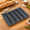 Black, variant on Orange Silicone Perforated Baguette Baking Pan 5 Loaf Capacity