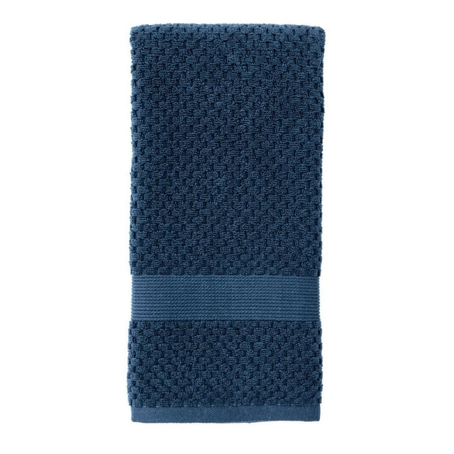 Better Homes & Gardens Signature Soft Popcorn Texture Towel in blue with textured pattern and smooth band.