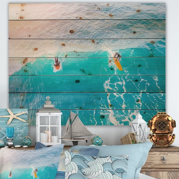 Designart 'Two Surfers on A Bright Sunny Ocean Wave' Traditional Print on Natural Pine Wood
