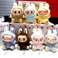 thumbnail image 5 of En Stock figura de Anime Labubu tiene un asiento serie PVC colgante muñeca modelo juguete Kawaii monstruo réplica llavero juguete regalo de cumpleaños, 5 of 5