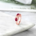 thumbnail image 4 of Gem Stone King 18K Rose Gold Plated Silver Red Ruby and White Created Sapphire Infinity Love Knot Ring for Women | 1.31 Cttw | Oval 6X4MM | Gemstone Birthstone | Jewelry Gifts for Mom Wife | Size 9, 4 of 5