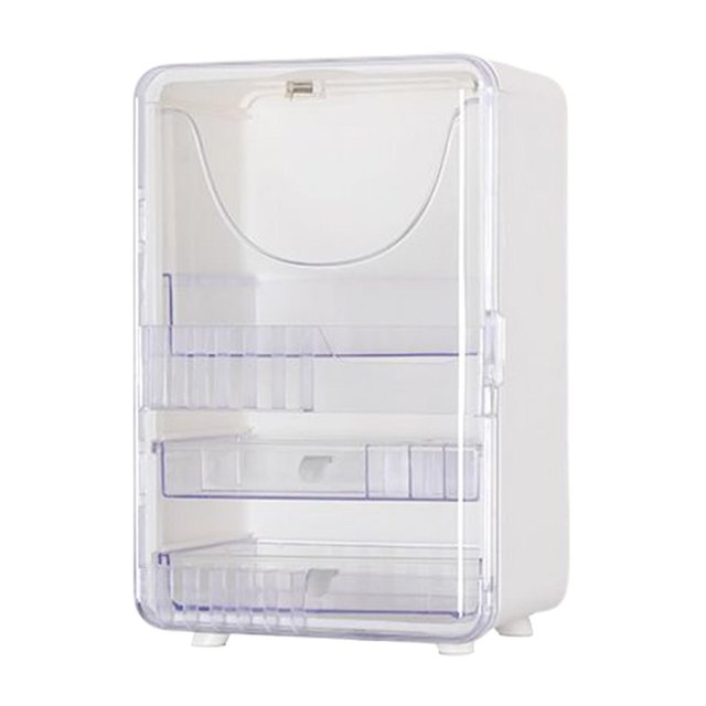 almacenamiento de cosméticos contenedor de productos de maquillaje Gloria blanco, vista frontal centrada de caja de polipropileno 28.5x20.5x41.5 cm con cubierta frontal transparente y cierre magnético; tres bandejas extraíbles con separadores y borde elevado para botellas altas, patas pequeñas en fondo neutro; también adecuado para organizar accesorios de tocador.