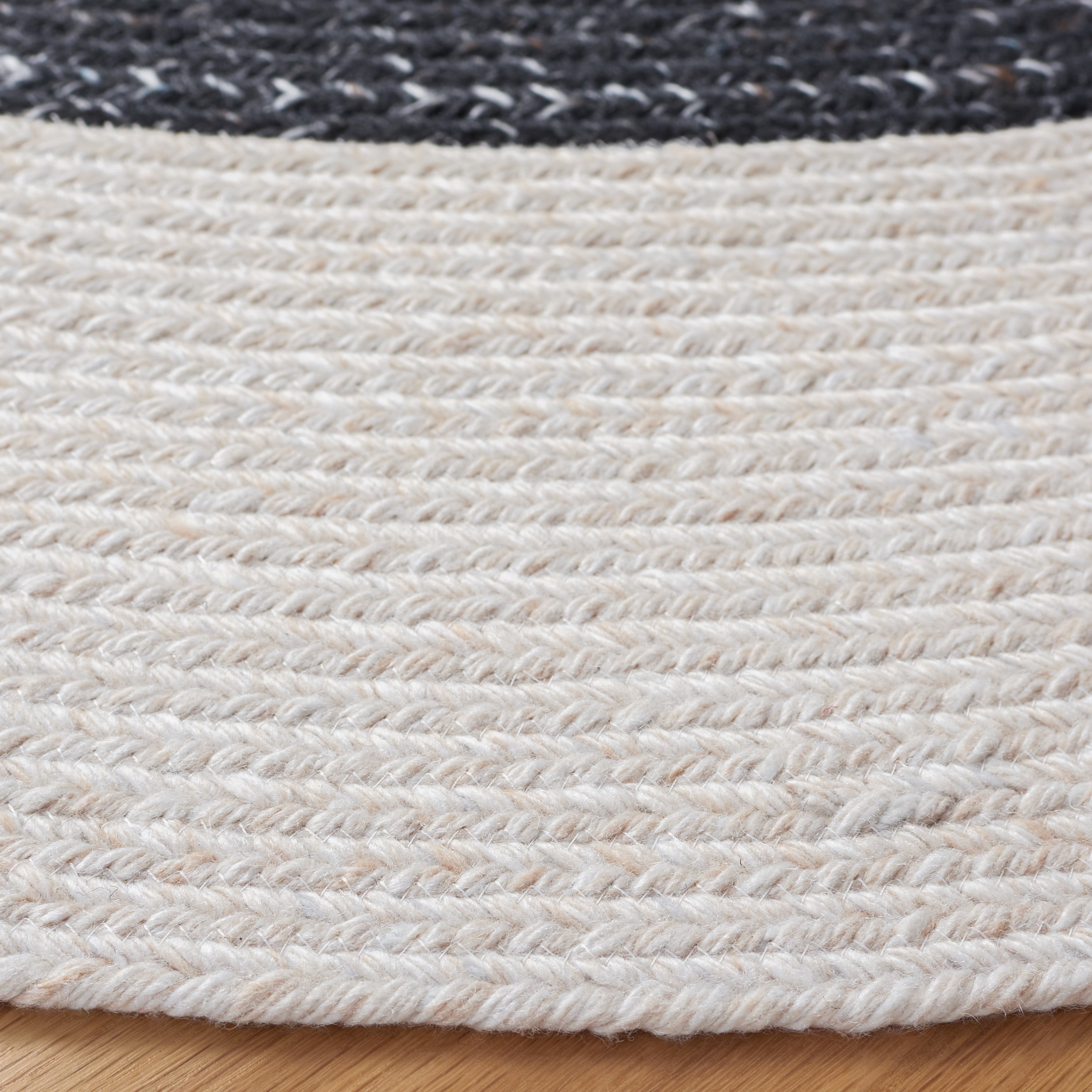 SAFAVIEH Braided Celinda Solid Polyester Reversible Area Rug, Black/Ivory, 5' x 5' Round