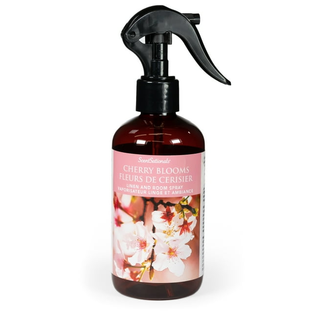 ScentSationals Cherry Blooms linen and room spray in amber bottle with black trigger sprayer, labeled with pink cherry blossom design.