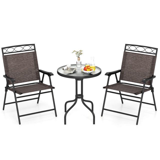 Costway 3 PCS Outdoor Bistro Dining Furniture Set featuring a round rippled tempered glass table with a 1.57-inch umbrella hole and two folding chairs. The chairs have a sturdy metal frame with breathable brown fabric seats and backrests, offering comfort and support. The table and chairs are designed for outdoor use, with the table accommodating up to 135 lbs and each chair supporting up to 330 lbs. The set is ideal for patios, balconies, or small outdoor spaces.