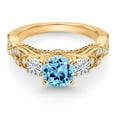 thumbnail image 2 of Gem Stone King 18K Yellow Gold Plated Silver Swiss Blue Topaz and White Moissanite Engagement Ring for Women (1.47 Cttw, Gemstone November Birthstone, Round 6MM and 3MM, Size 8), 2 of 4
