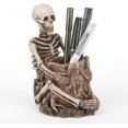 thumbnail image 1 of Skull pen holder, 1 of 5