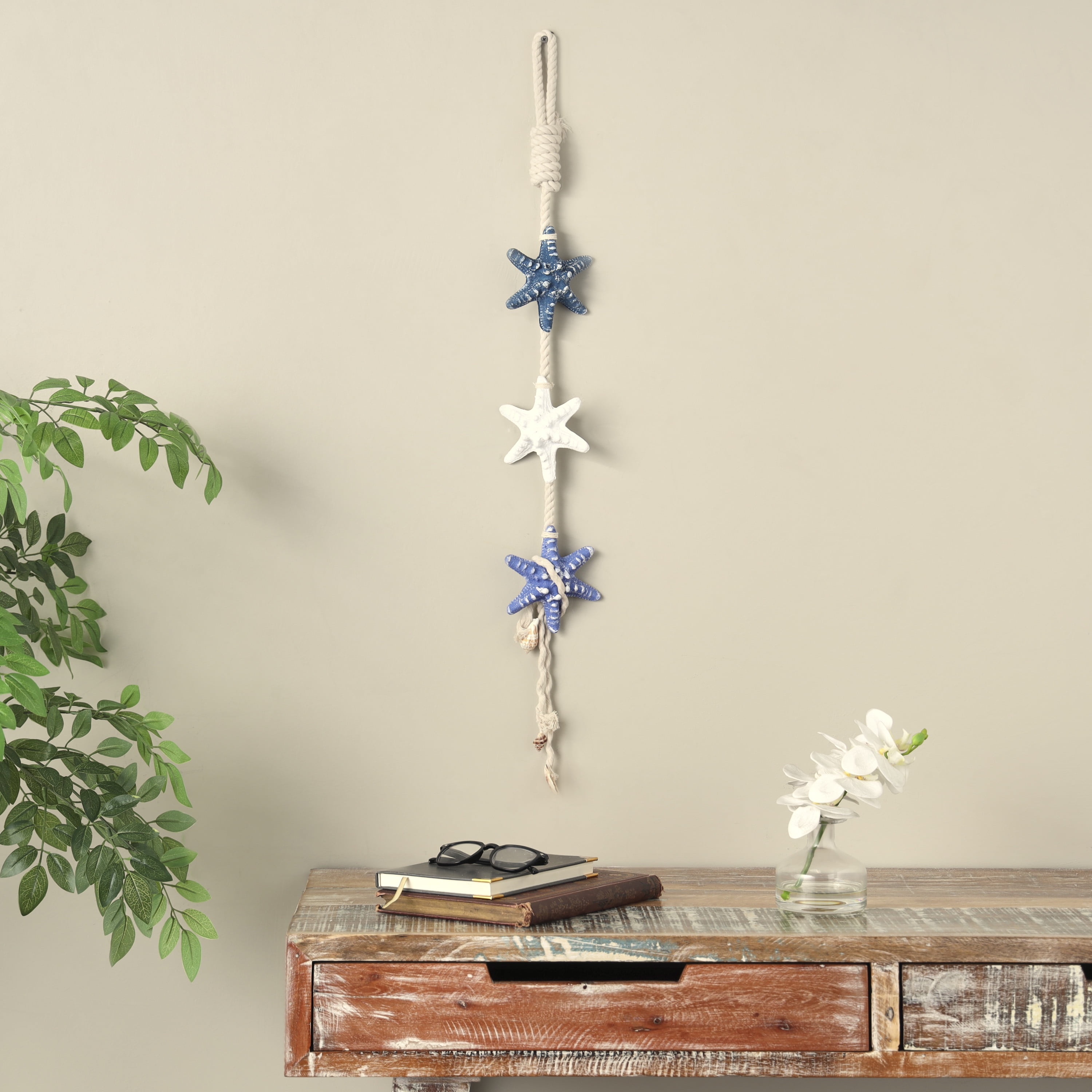 DecMode Cream Resin Handmade Layered Starfish Wall Decor with White Hanging Rope and Seashell Accents