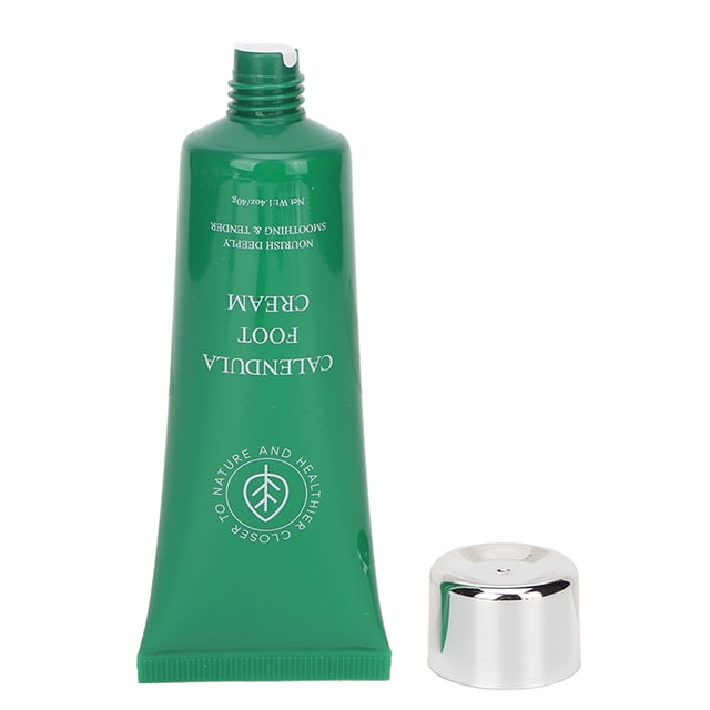 crema hidratante para pies anggrek crema multiusos de caléndula 40 g tubo verde, vista frontal centrada con boquilla abierta y tapa plateada a un lado; envase plástico con texto blanco y logotipo circular sobre fondo blanco, para pies secos o agrietados y a menudo usada también para nutrir talones resecos.