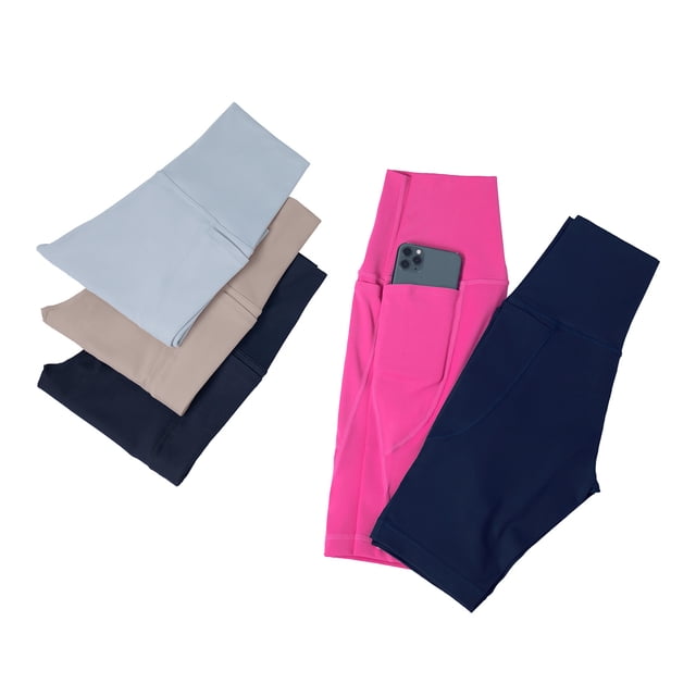 pantalones de yoga desnudos al aire libre para mujer, pantalones cortos de cintura alta con bolsillo y ajustados a la cadera — shorts planos en tela elástica tipo spandex (negro y otros tonos) con silueta ajustada a la cadera, pretina ancha para control de abdomen, bolsillo lateral con teléfono visible y costuras planas, fondo blanco; también adecuados como shorts deportivos para paseo o entrenamiento ligero.