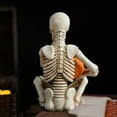 thumbnail image 4 of Halloween Skeleton Figurine with Pumpkin, Unique Sitting Skeleton Statue for Indoor Outdoor Home Party Decor, Spooky Table Centerpiece Ornament, Durable Resin,, 5.12 Inch Tall, 1PC, 4 of 6