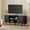 Black, variant on MARNUR 55" TV Stand for 60" TV, Wood Entertainment Center with Storage and Shelves, 2 Sliding Tambour Doors, Mid-Century Modern