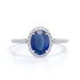 thumbnail image 4 of JeenMata Classic Halo Design 1.50 TCW Oval Cut Lab-Created Blue Sapphire and Moissanite Pave Accented Engagement Ring in 18K White Gold Plating over Silver, 4 of 6