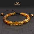 thumbnail image 2 of Amberalia Adjustable Adult Baltic Amber Bracelet, helps in pain relief - boost immune system - ONE SIZE FITS MOST - Light Green Black Thread, 2 of 5