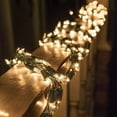 thumbnail image 2 of Wintergreen Lighting Clear Cluster String Lights Garland, 9ft, 300 Lights, Green Wire Christmas Patio Porch Railing Banister Wedding Party Lights, 2 of 6