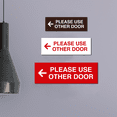 thumbnail image 3 of All Quality PLEASE USE OTHER DOOR Sign - (Left Arrow) (Red) - Small 2" x 6", 3 of 5