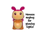 thumbnail image 4 of Playskool Glo Friends - ¡Hugbug y Harmony Pop, Push & Roll! - Vehículo cisne - Insecto resplandeciente - Juguete SEL - Edades 2+, 4 of 5