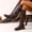 Brown, variant on Women's Casual Knee High Boots,Mid Heel Block Heel,Round Toe Back Zipper,Adjustable Buckles,Faux Leather,Comfortable Cushioned Footbed,Durable Rubber Outsole,Indoor Wear,Fall Winter Fashion Brown
