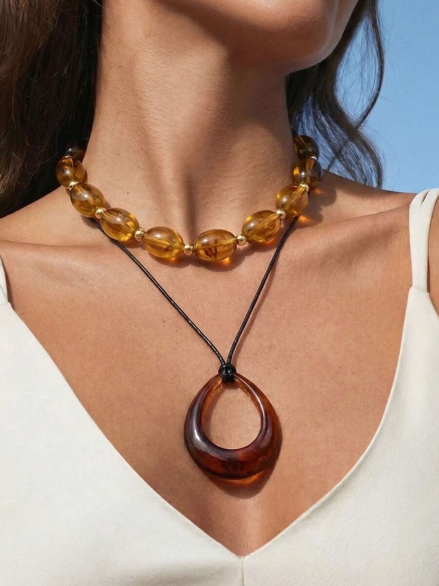 Brown Circular Acrylic Pendant Necklace With Black Leather Cord