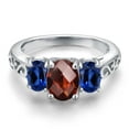 thumbnail image 3 of Gem Stone King 925 Sterling Silver Red Garnet and Blue Created Sapphire Filigree Style 3 Stone Ring for Women (2.73 Cttw, Oval 8X6MM and 6X4MM) (Size 6), 3 of 6