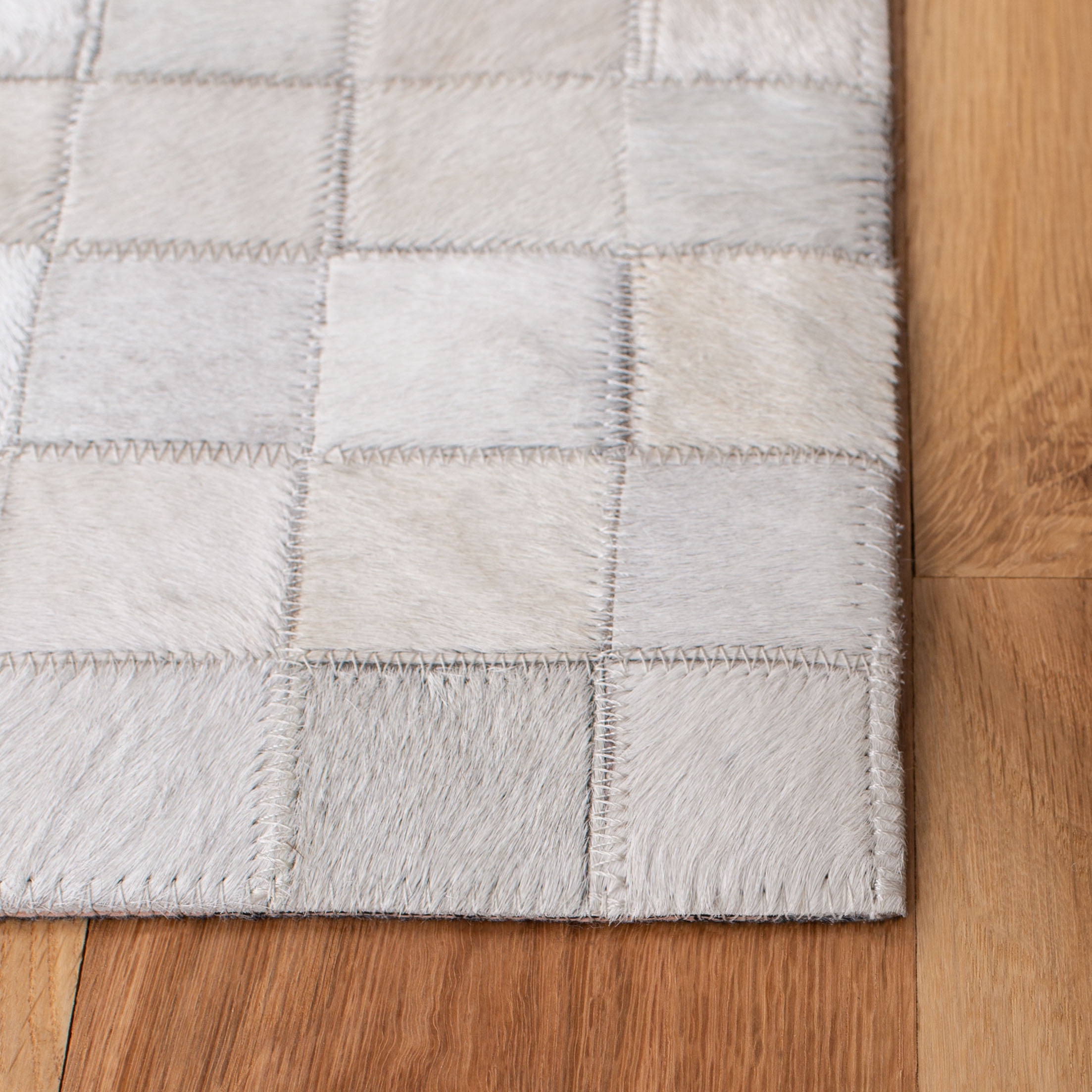 SAFAVIEH Studio Leather Cherette Geometric Area Rug, Ivory/Black, 9' x 12'